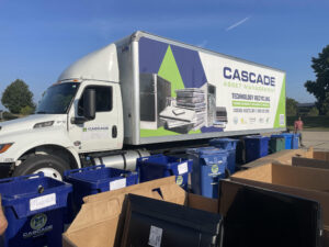 Truck with collection bins ready to be filled with tech donations.